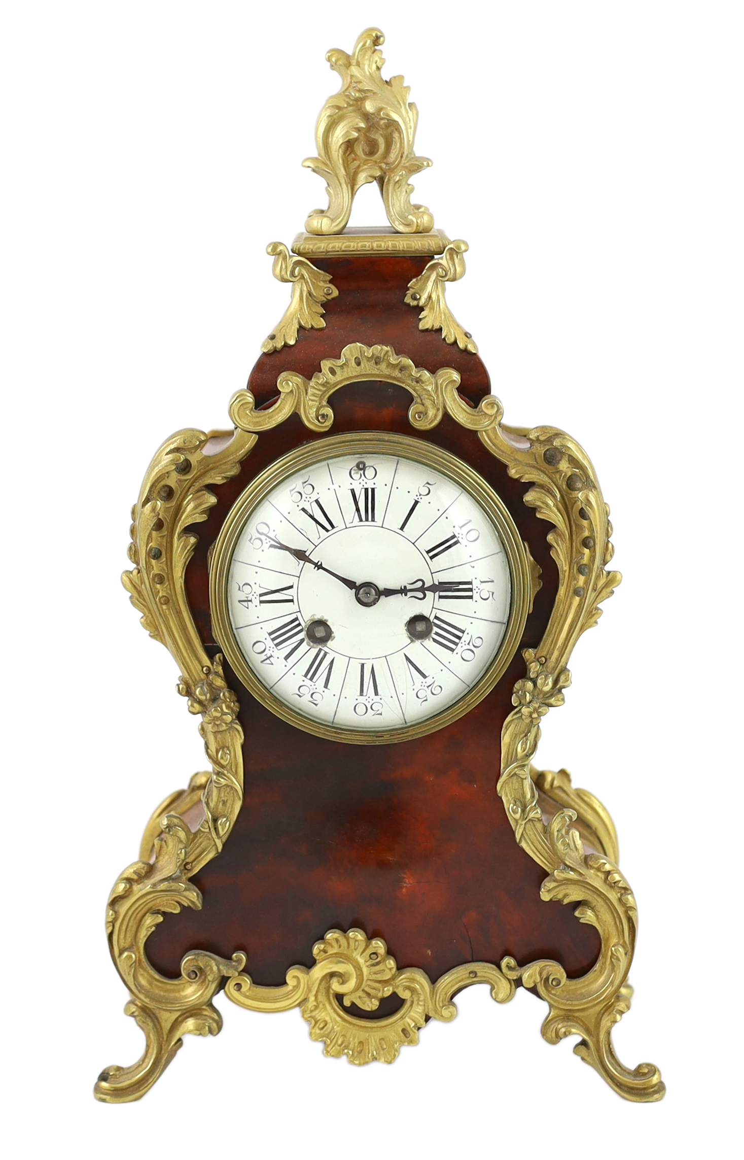 An early 20th century French ormolu mounted red tortoiseshell eight day mantel clock, 22cm wide, 12cm deep, 40cm high